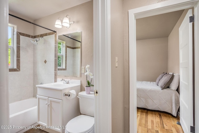 1114 Blake Ave, Glenwood Springs, CO 81601 - full bathroom featuring vanity, wood finished floors, and tub / shower combination