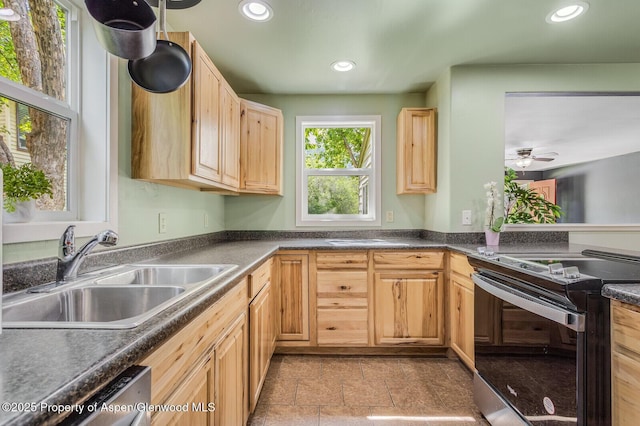 1114 Blake Ave, Glenwood Springs, CO 81601 - kitchen with electric range, light brown cabinets, stainless steel dishwasher, recessed lighting, and dark countertops