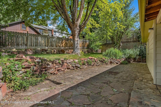 1114 Blake Ave, Glenwood Springs, CO 81601 - fenced backyard with a patio