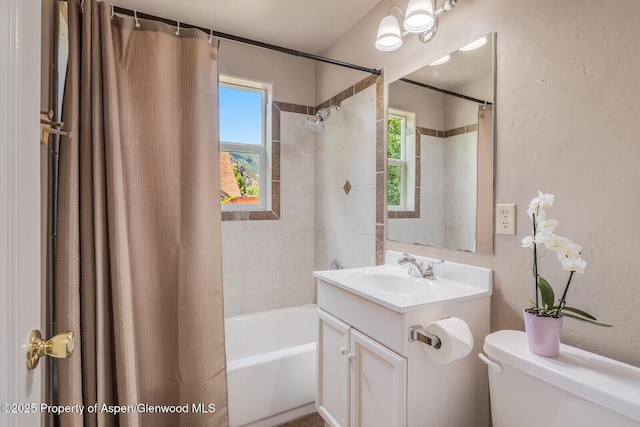 1114 Blake Ave, Glenwood Springs, CO 81601 - bathroom featuring shower / tub combo, vanity, and a textured wall