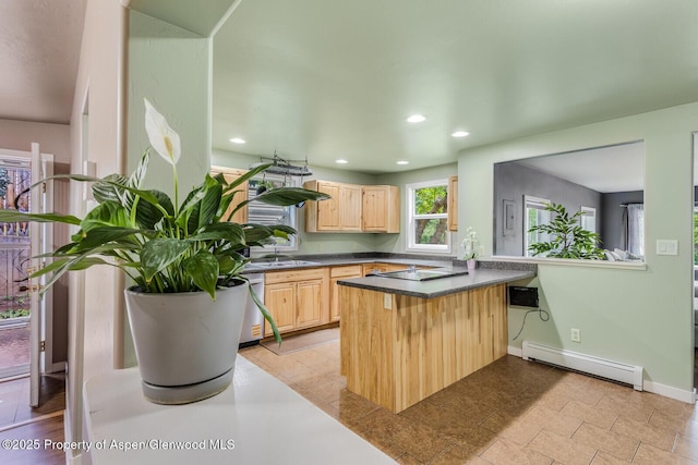 1114 Blake Ave, Glenwood Springs, CO 81601 - kitchen with baseboard heating, light brown cabinets, dark countertops, a peninsula, and recessed lighting