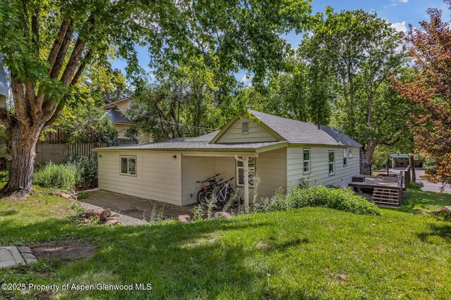 1114 Blake Ave, Glenwood Springs, CO 81601 - view of front of property featuring a deck and roof with shingles