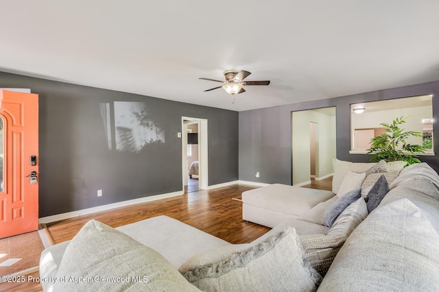 1114 Blake Ave, Glenwood Springs, CO 81601 - living area with ceiling fan and wood finished floors