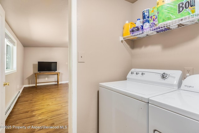 1114 Blake Ave, Glenwood Springs, CO 81601 - washroom featuring separate washer and dryer, light wood-style floors, and a baseboard radiator