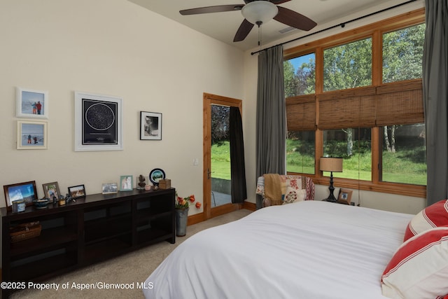 123 Corral Dr, Carbondale, CO 81623 - bedroom with carpet floors, access to exterior, and baseboards