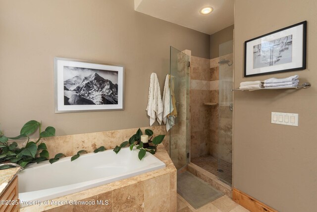 123 Corral Dr, Carbondale, CO 81623 - bathroom with a bath, vanity, and tiled shower