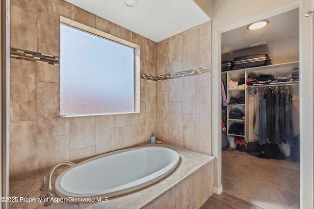 1326 Fairway Dr, Fruita, CO 81521 - full bathroom with a garden tub and a walk in closet