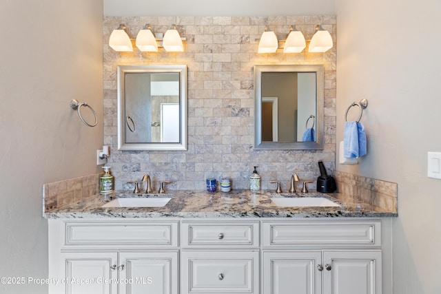 1326 Fairway Dr, Fruita, CO 81521 - bathroom with double vanity, decorative backsplash, and a sink
