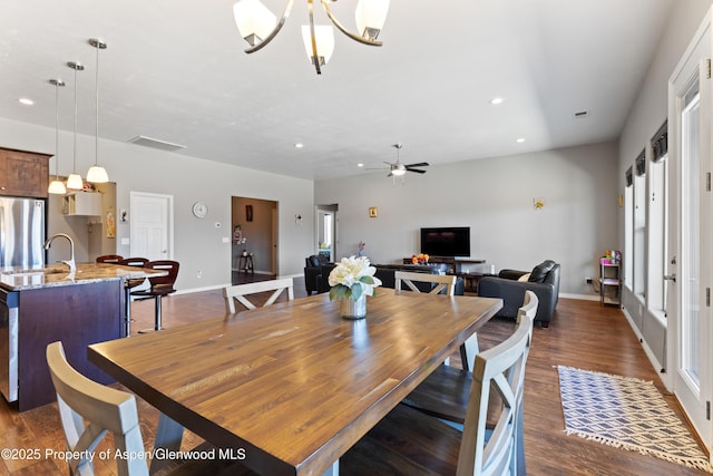 1326 Fairway Dr, Fruita, CO 81521 - dining area with recessed lighting, dark wood-style flooring, visible vents, and baseboards