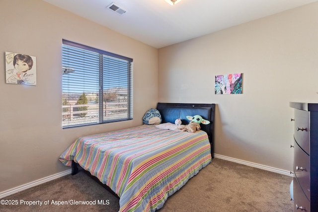 1326 Fairway Dr, Fruita, CO 81521 - bedroom featuring carpet floors, visible vents, and baseboards