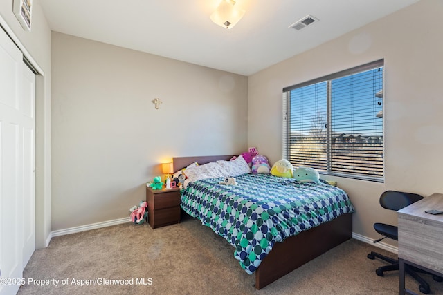 1326 Fairway Dr, Fruita, CO 81521 - bedroom featuring carpet, a closet, visible vents, and baseboards