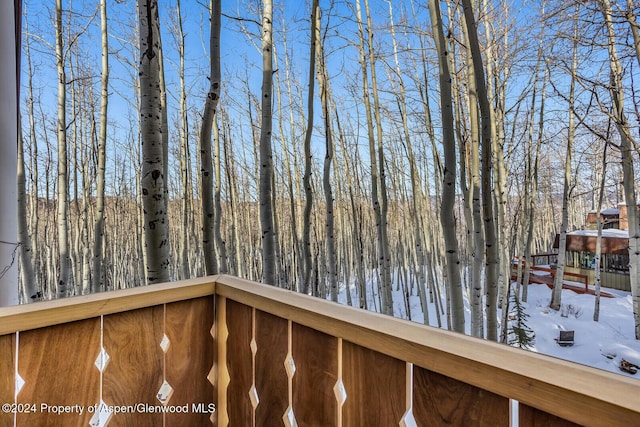 view of snow covered deck