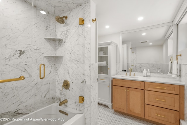 bathroom with shower / bath combination with glass door, vanity, visible vents, and recessed lighting