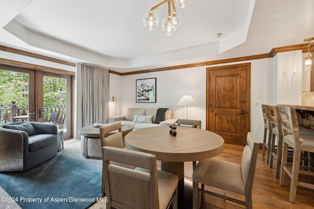 415 E Dean St Unit 32, Aspen, CO 81611 - dining area featuring a raised ceiling, french doors, and wood finished floors