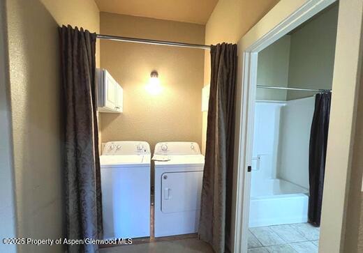 laundry area featuring washer and dryer