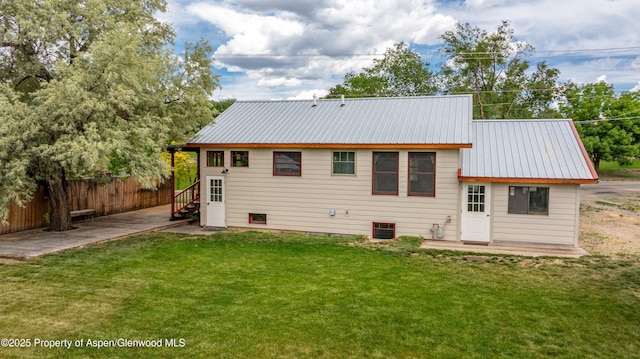 456 County Road 294, Rifle, CO 81650 - rear view of house featuring metal roof