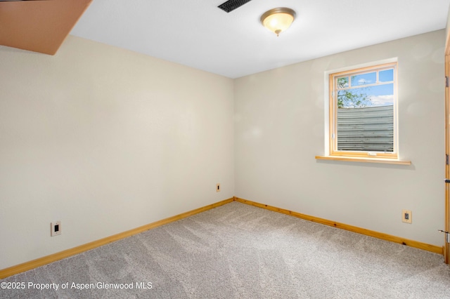 456 County Road 294, Rifle, CO 81650 - carpeted empty room featuring baseboards