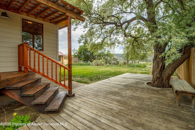456 County Road 294, Rifle, CO 81650 - wooden terrace featuring a yard