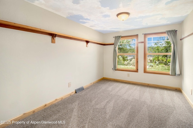 456 County Road 294, Rifle, CO 81650 - empty room with light colored carpet and baseboards