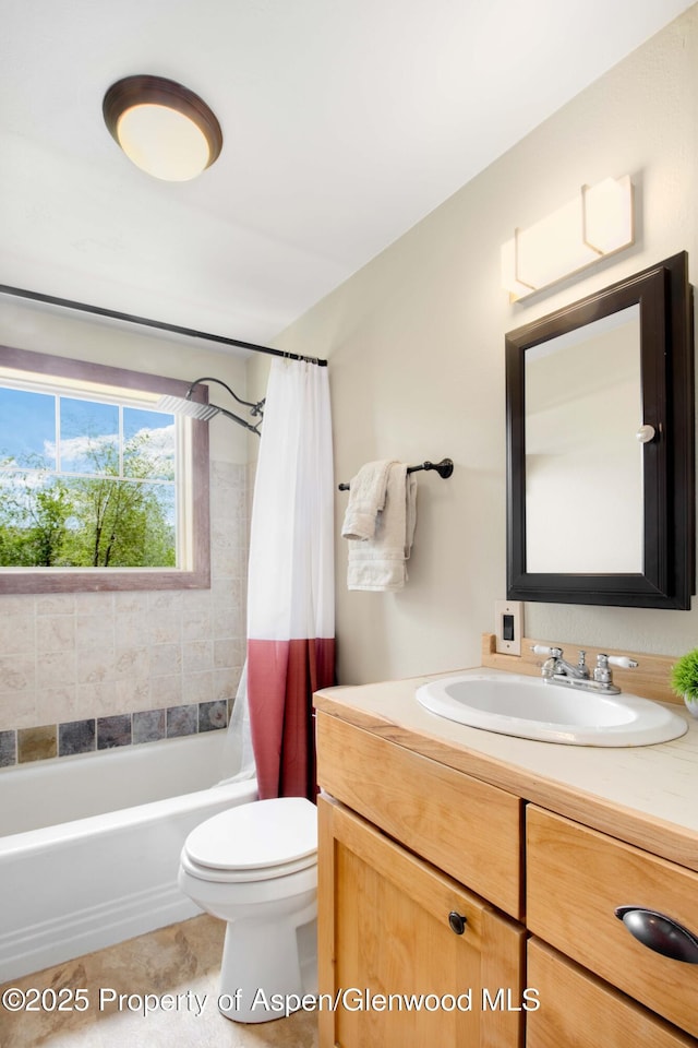 456 County Road 294, Rifle, CO 81650 - bathroom with vanity, toilet, shower / bath combo with shower curtain, and tile patterned floors
