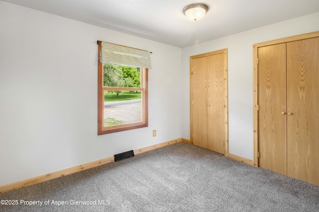 456 County Road 294, Rifle, CO 81650 - unfurnished bedroom with carpet and baseboards