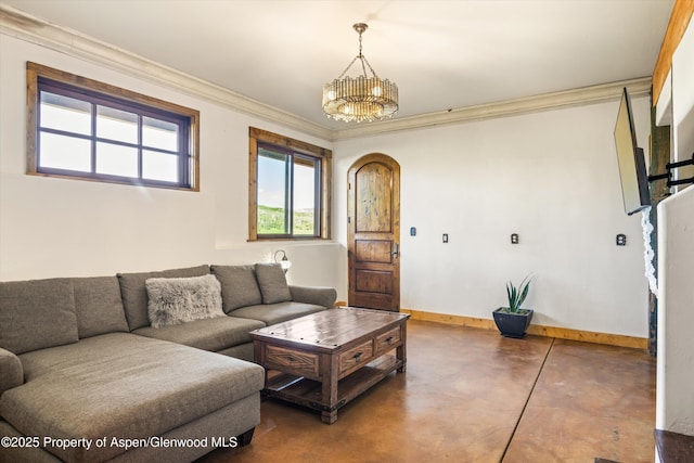 200 Forest Dr, Carbondale, CO 81623 - living area with concrete flooring, ornamental molding, a chandelier, and baseboards