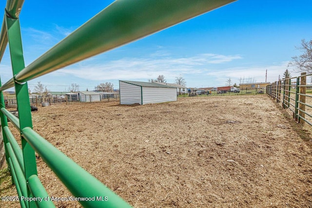 1020 Thompson Way, Craig, CO 81625 - view of yard with an outdoor structure, an exterior structure, and an enclosed area