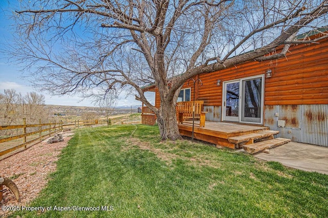 1020 Thompson Way, Craig, CO 81625 - view of yard with a wooden deck and fence