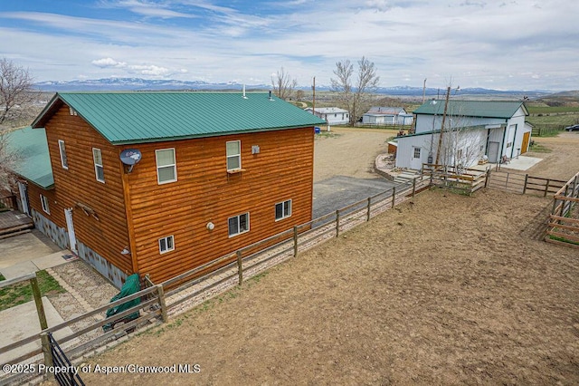 1020 Thompson Way, Craig, CO 81625 - view of side of home with fence and metal roof