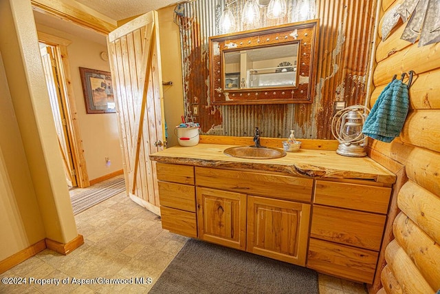 1020 Thompson Way, Craig, CO 81625 - bathroom with baseboards and vanity