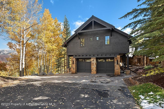 view of property exterior with a garage