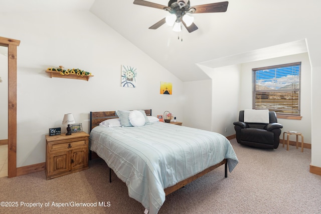 carpeted bedroom featuring vaulted ceiling and ceiling fan