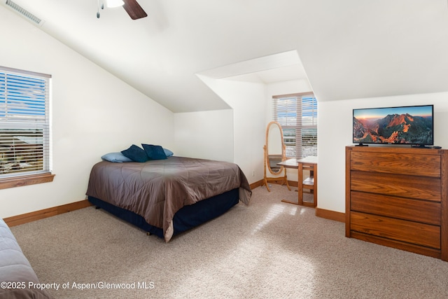 carpeted bedroom featuring ceiling fan and lofted ceiling