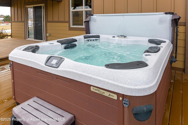 exterior details featuring a jacuzzi