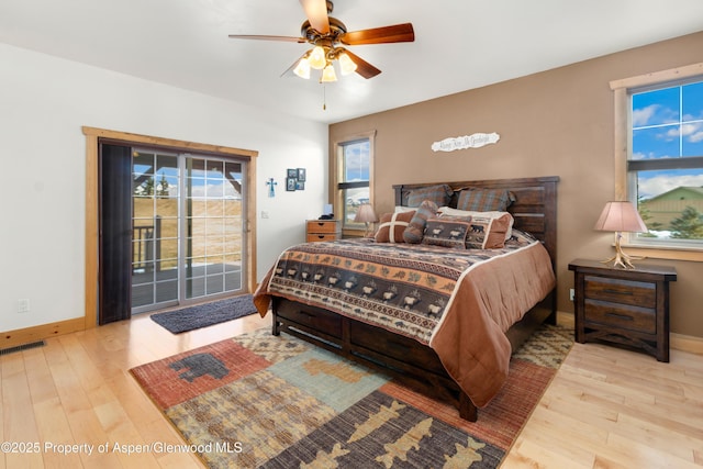 bedroom with access to outside, ceiling fan, and light hardwood / wood-style floors