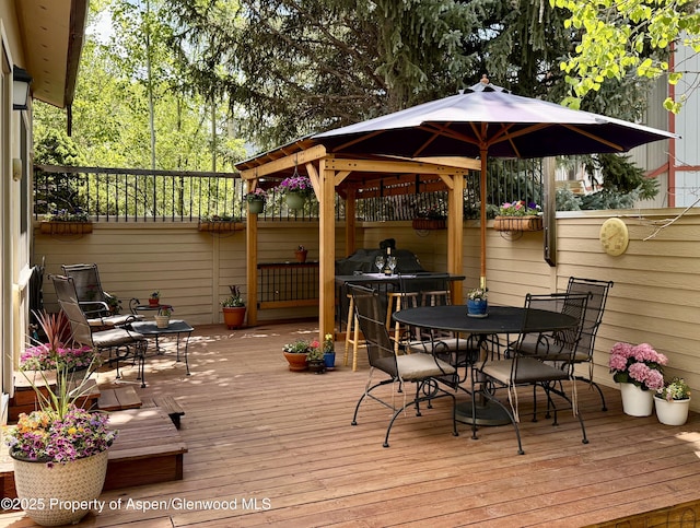 191 Navajo, Carbondale, CO 81623 - wooden terrace featuring outdoor dining space and a gazebo