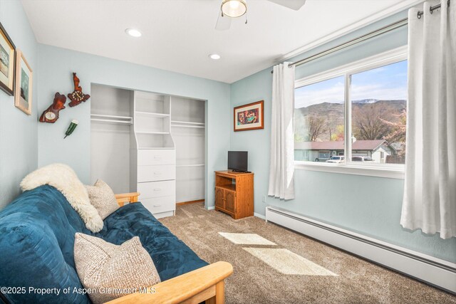 191 Navajo, Carbondale, CO 81623 - living area featuring baseboard heating, carpet flooring, a ceiling fan, recessed lighting, and baseboards
