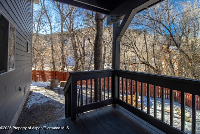 view of snow covered deck