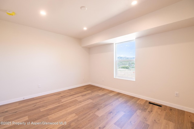 1720 Belgian Loop, Silt, CO 81652 - empty room with baseboards, light wood-style floors, and recessed lighting