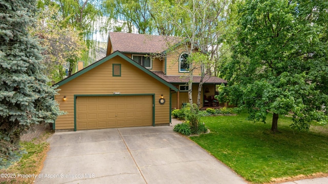 170 Deer Run, Carbondale, CO 81623 - chalet / cabin featuring a front yard, driveway, a porch, an attached garage, and roof with shingles