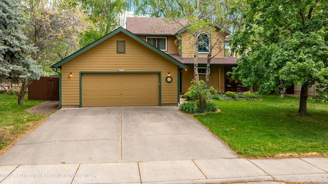 170 Deer Run, Carbondale, CO 81623 - view of front facade with concrete driveway and a garage