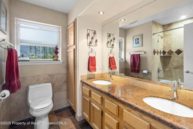 170 Deer Run, Carbondale, CO 81623 - bathroom with toilet, tile patterned floors, a shower, double vanity, and recessed lighting