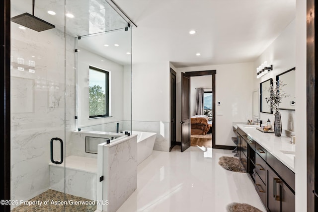 bathroom with vanity and walk in shower