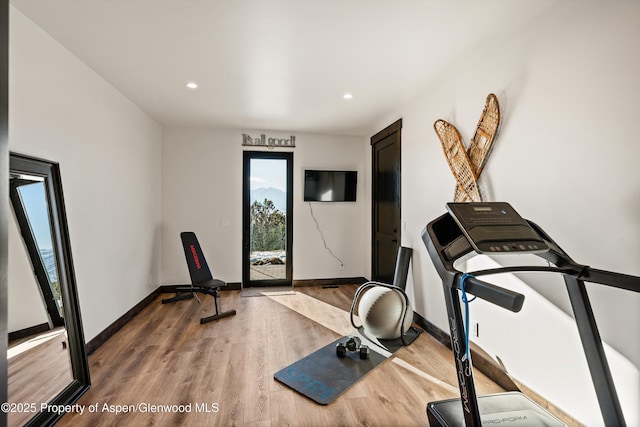 exercise area with hardwood / wood-style floors