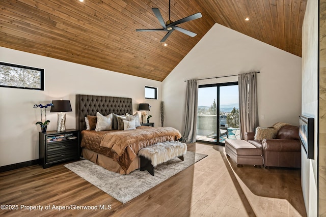 bedroom with high vaulted ceiling, hardwood / wood-style flooring, access to outside, ceiling fan, and wood ceiling