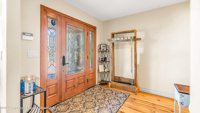 entrance foyer with light hardwood / wood-style floors