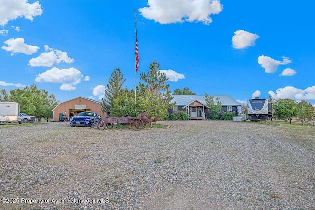 550 County Road 22, Craig, CO 81625 - view of front of property with a garage and a metal roof