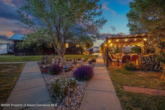 550 County Road 22, Craig, CO 81625 - view of green lawn with a pergola