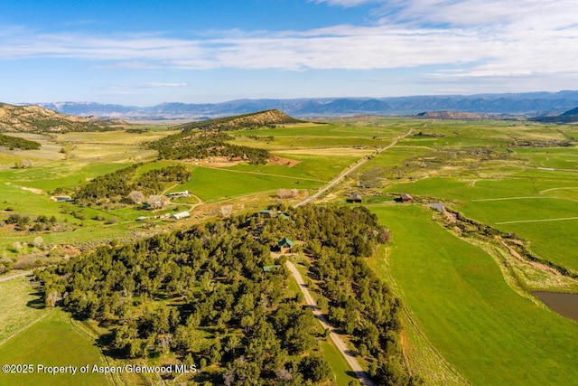 bird's eye view featuring a mountain view and a rural view