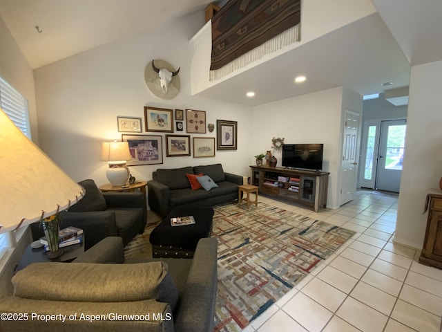 758 Pine Ct, New Castle, CO 81647 - living room featuring high vaulted ceiling and light tile patterned floors